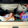 01-kacey-waking-up-from-our-snug-little-cave-in-the-back-of-the-truck-it-was-too-windy-to-use-our-pop-up-tent-topper